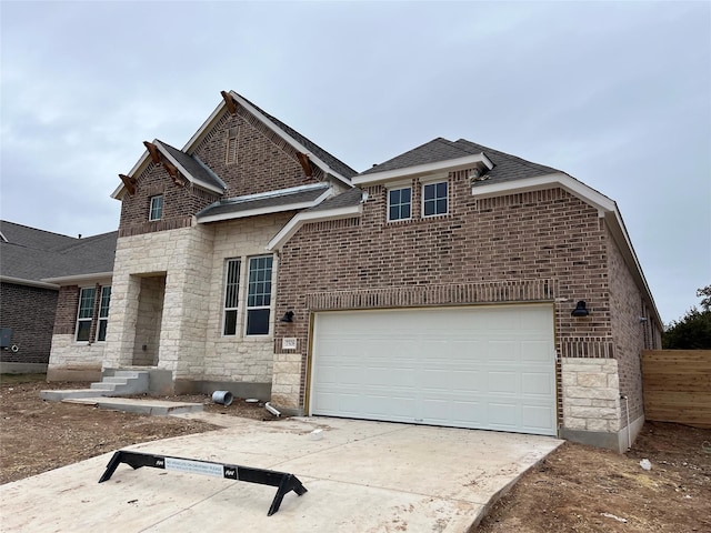 view of front of property with a garage