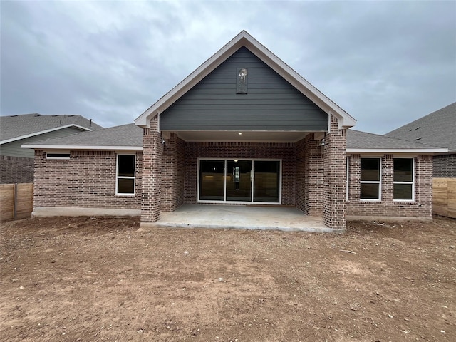 back of house with a patio area