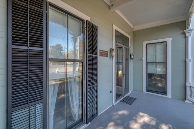 property entrance with covered porch