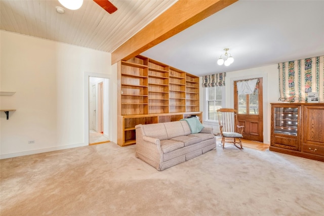 living room with light carpet, ceiling fan, lofted ceiling with beams, and wooden ceiling