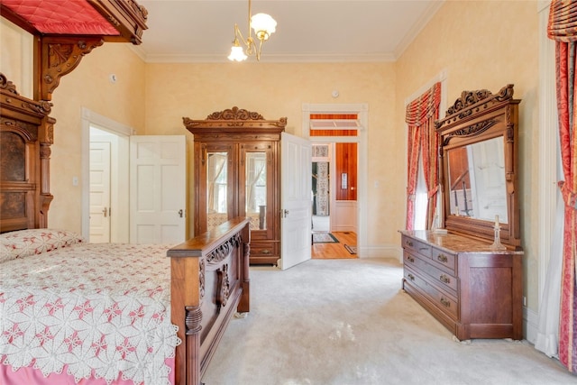 carpeted bedroom with ornamental molding and an inviting chandelier