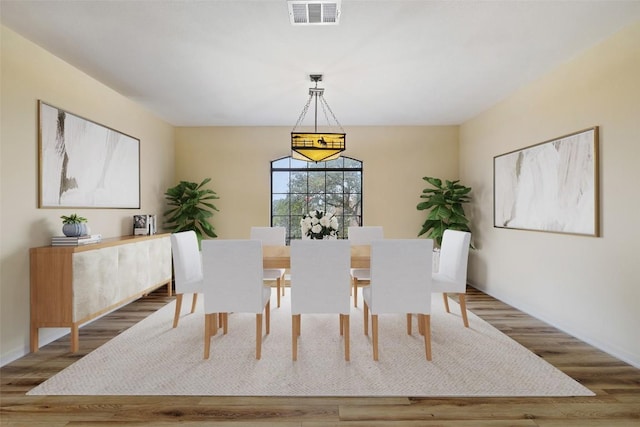 dining room featuring hardwood / wood-style flooring