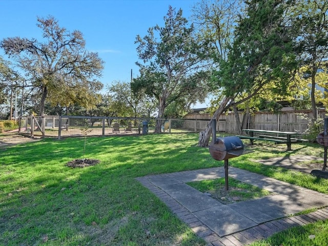 view of community featuring a lawn