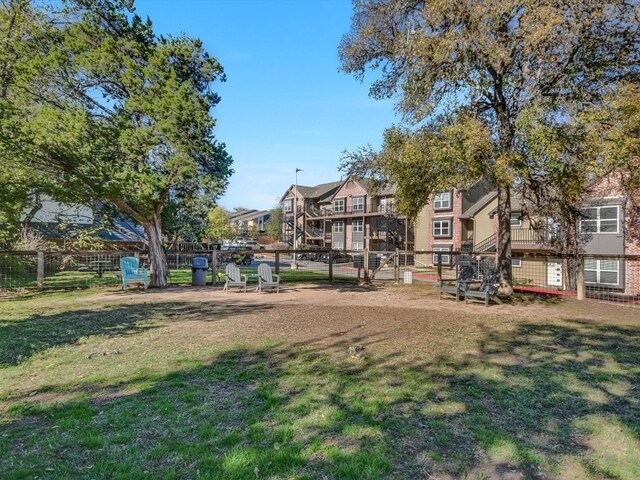 view of community featuring a lawn