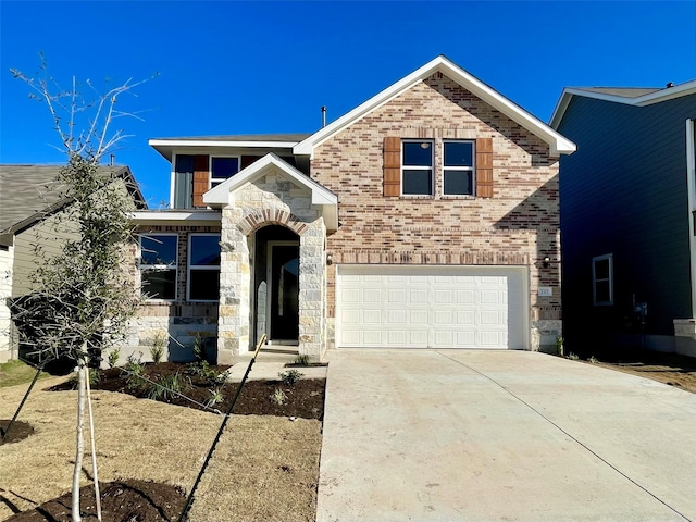 view of front of property with a garage