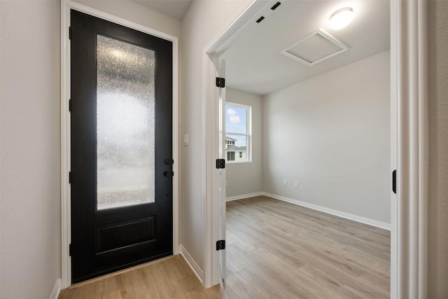 727 Palo Brea Loop, Hutto, TX 78634 - entrance foyer with light wood-type flooring and baseboards
