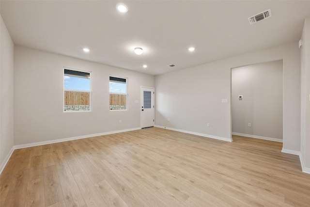 727 Palo Brea Loop, Hutto, TX 78634 - empty room with light wood-style flooring, baseboards, and recessed lighting