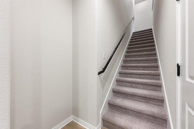 727 Palo Brea Loop, Hutto, TX 78634 - staircase featuring baseboards