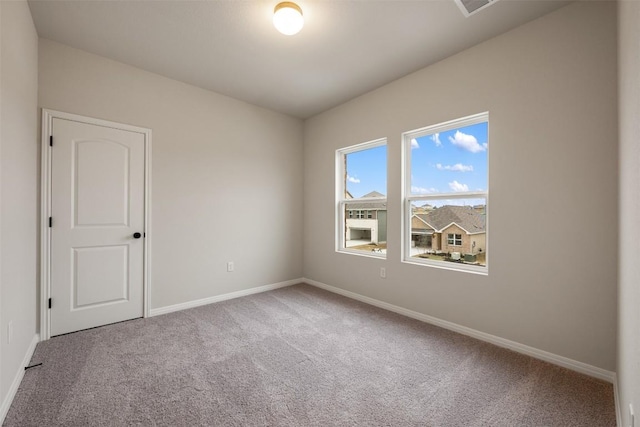 727 Palo Brea Loop, Hutto, TX 78634 - empty room with carpet and baseboards