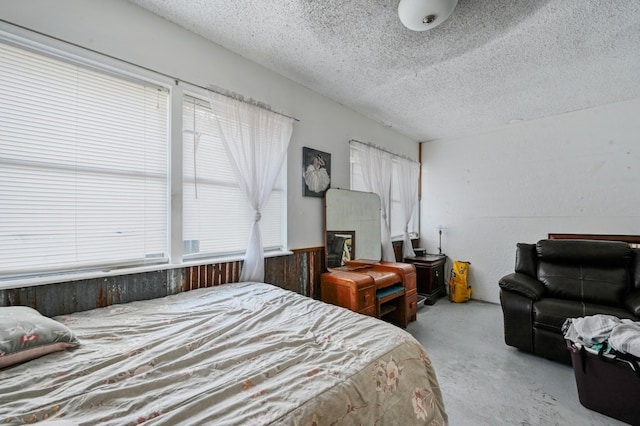 bedroom featuring a textured ceiling