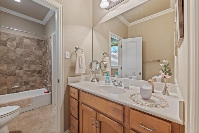 full bathroom with tile patterned floors, ornamental molding, vanity, tiled shower / bath combo, and toilet