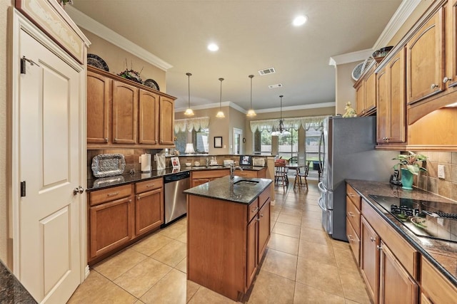 kitchen with crown molding, pendant lighting, a center island with sink, dishwasher, and light tile patterned flooring