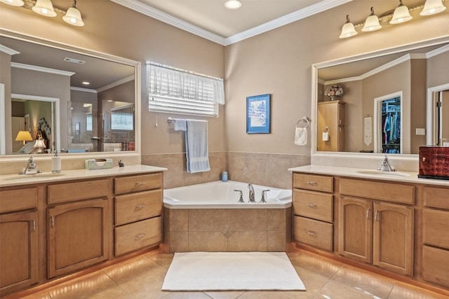 bathroom with tile patterned floors, crown molding, and vanity