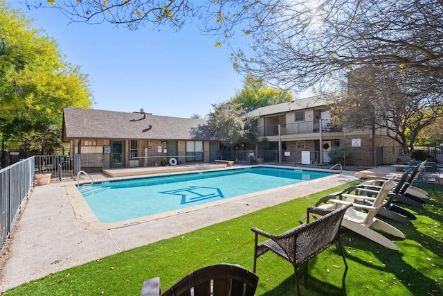 view of swimming pool with a patio