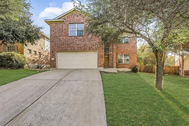 front of property featuring a garage and a front yard