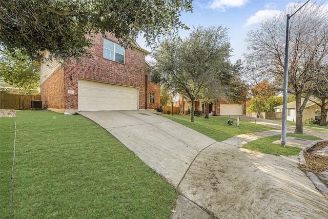 view of front of house with a front yard, a garage, and central air condition unit