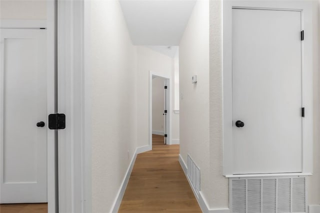 hall featuring light hardwood / wood-style flooring