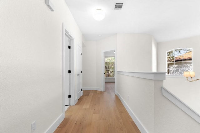 hallway featuring light hardwood / wood-style flooring