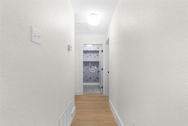 hall featuring light hardwood / wood-style flooring