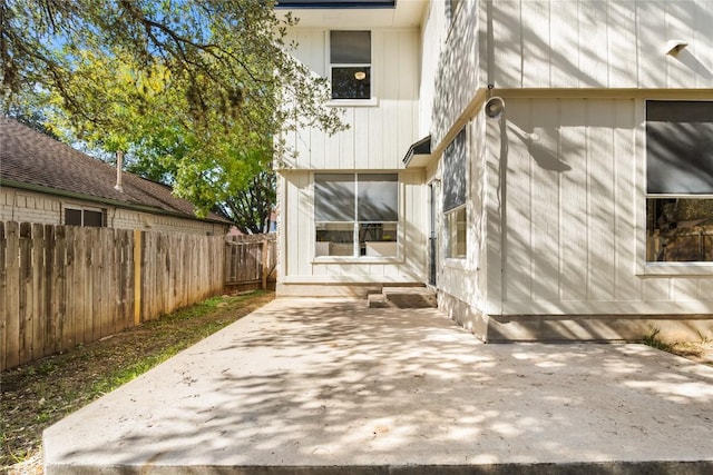 back of property featuring a patio area