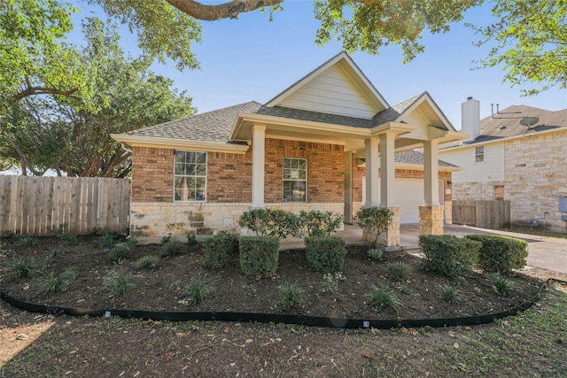 view of front of property featuring a garage