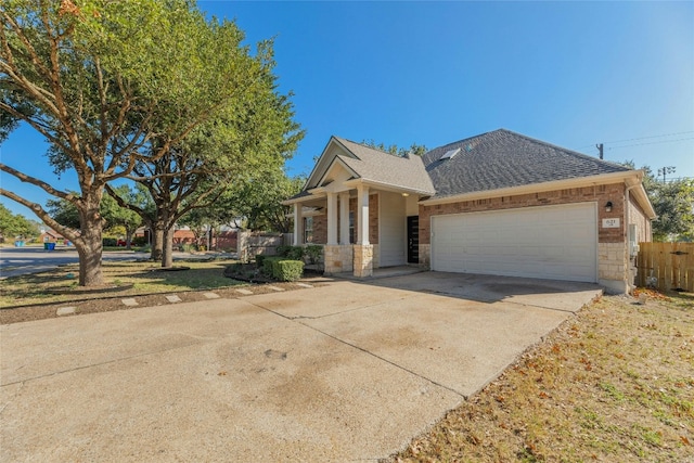 view of front of property with a garage