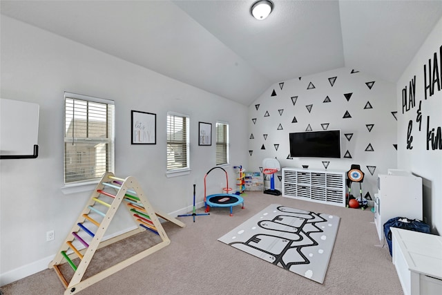 game room with lofted ceiling and carpet floors