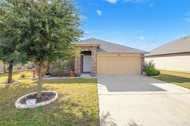 view of front of house featuring a garage and a front lawn