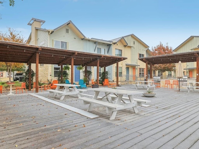 wooden deck with a pergola