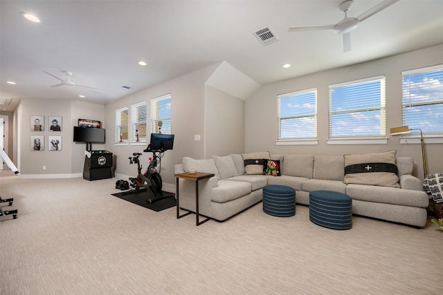 living room featuring light colored carpet and ceiling fan