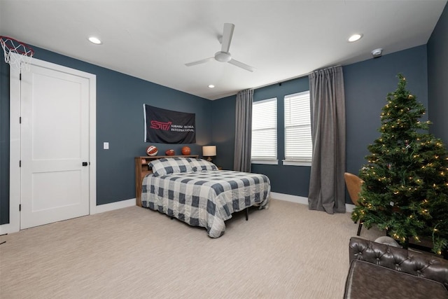 carpeted bedroom featuring ceiling fan