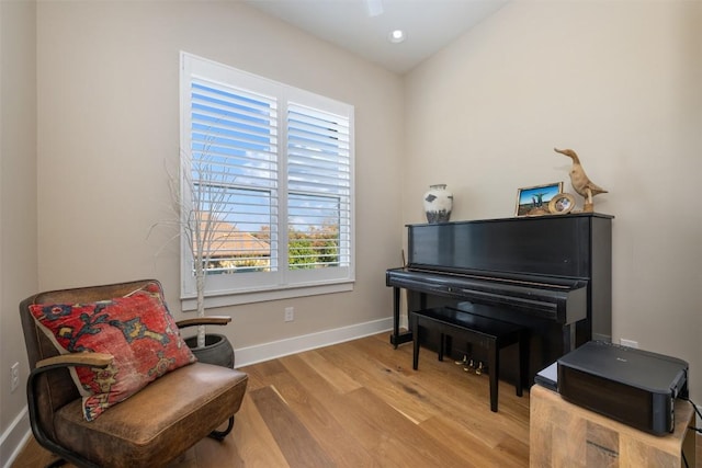 living area with light hardwood / wood-style floors