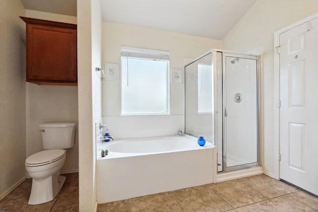 bathroom featuring tile patterned flooring, plus walk in shower, and toilet