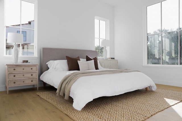 bedroom featuring hardwood / wood-style flooring