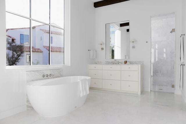 bathroom featuring vanity and shower with separate bathtub