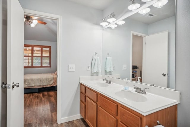 bathroom featuring vanity and wood-type flooring