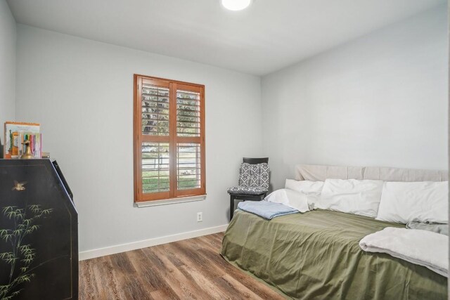 bedroom featuring hardwood / wood-style floors