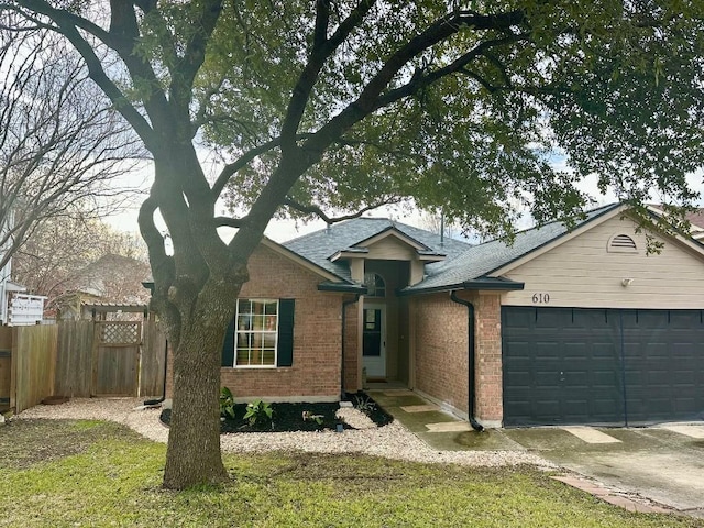 single story home featuring a garage