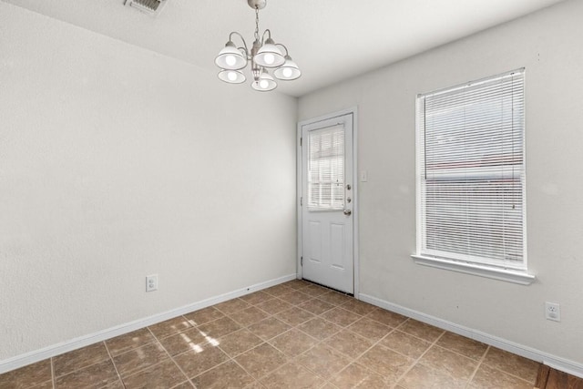 interior space featuring an inviting chandelier