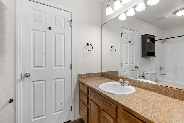 full bathroom featuring vanity, toilet, and shower / washtub combination