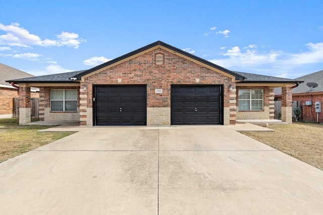 single story home with a garage