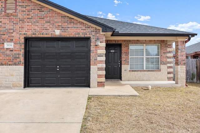 ranch-style home with a garage