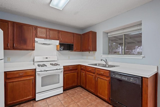 kitchen with a textured ceiling, sink, light tile patterned floors, and black appliances