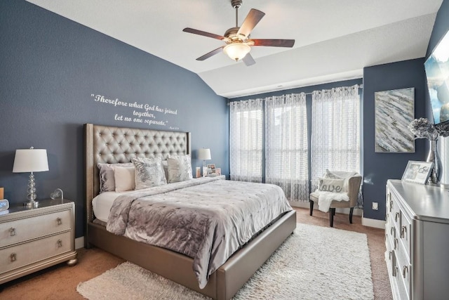 carpeted bedroom featuring ceiling fan and lofted ceiling