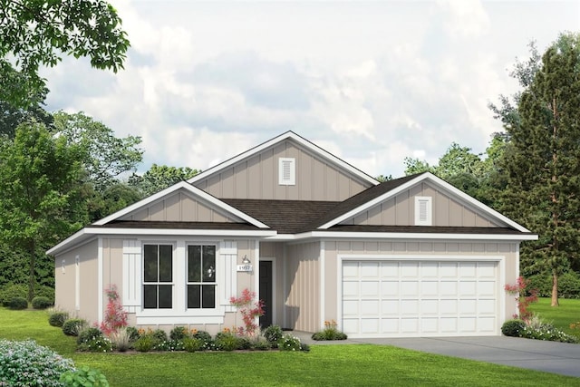 view of front of property with a garage and a front lawn