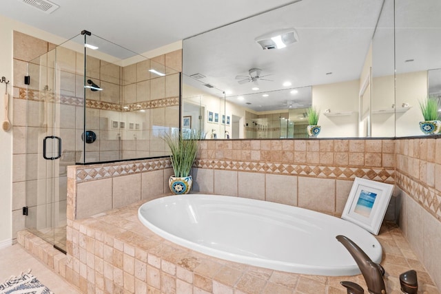 full bathroom with a garden tub, a shower stall, visible vents, and a ceiling fan