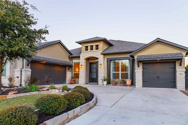 view of front of property with a garage