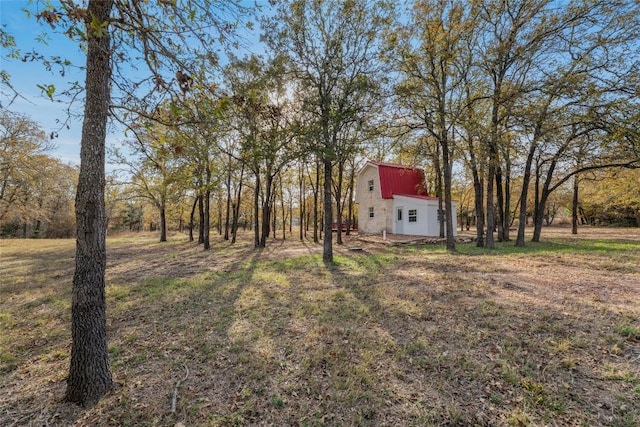 120 Laguna, Smithville, TX 78957 - view of yard with an outdoor structure