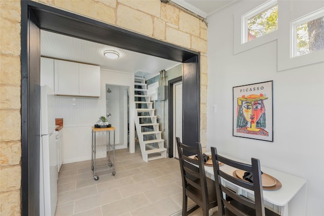 view of tiled dining space