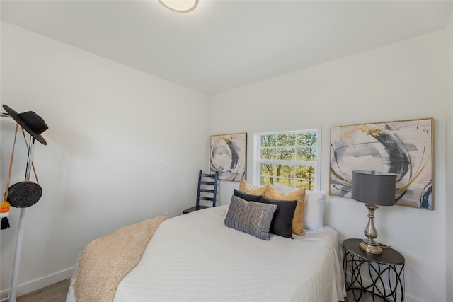 bedroom featuring wood-type flooring